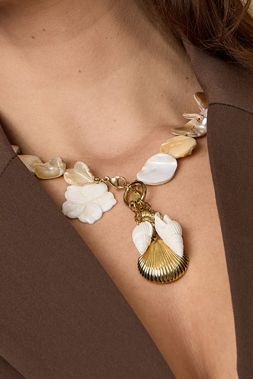 Necklace with beads of seashells, pearls and dangling shells