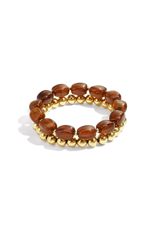 Bracelet set with asymmetrical beads