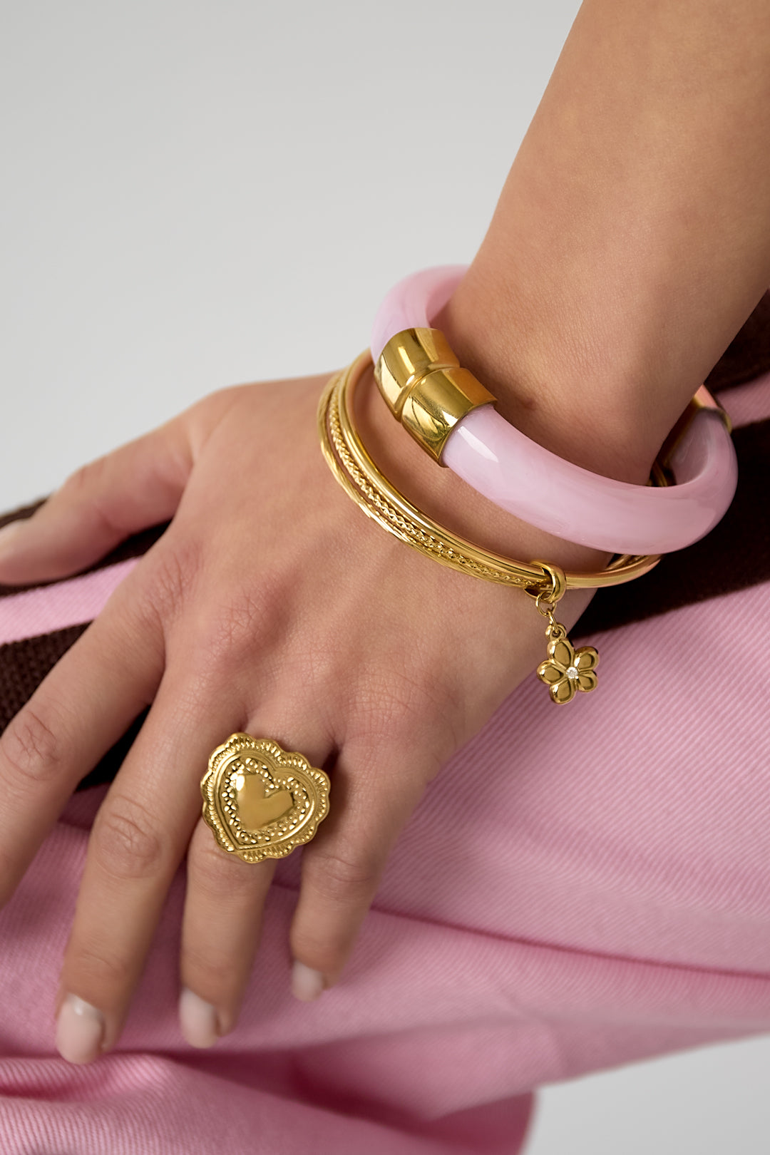 Bangles with hanging flower charm