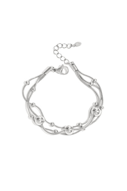 Bracelet with chains and polka dots
