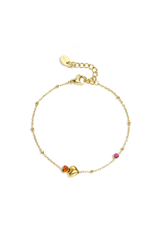 Bracelet with hearts, colored stones, and dots
