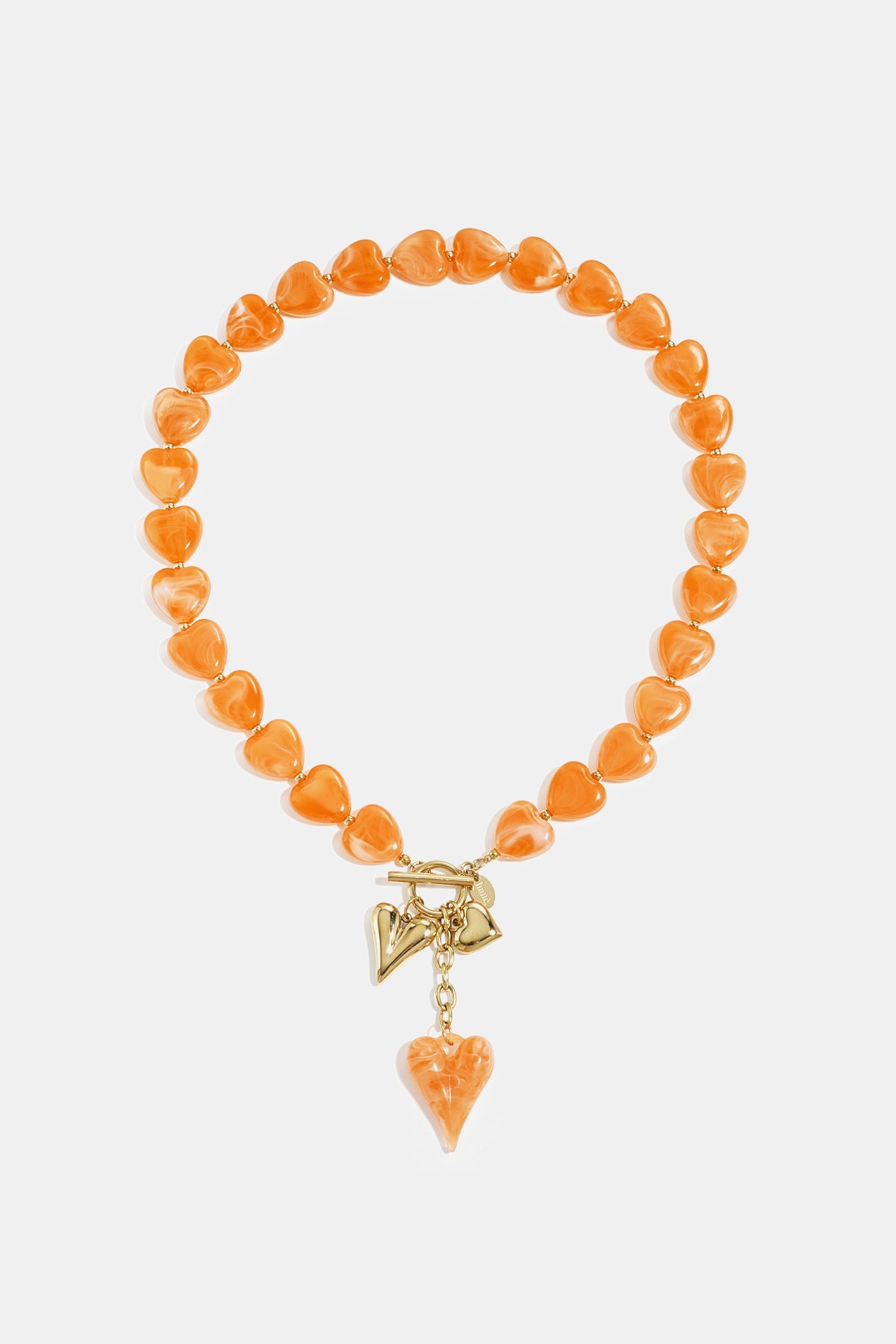 Bead necklace with hanging heart charms